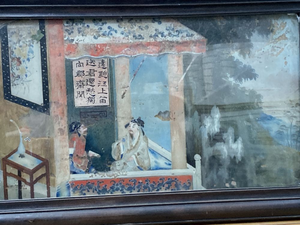 19th century Chinese School, reverse painted glass panel, Figures on a balcony, 24 x 45cm, original hardwood frame